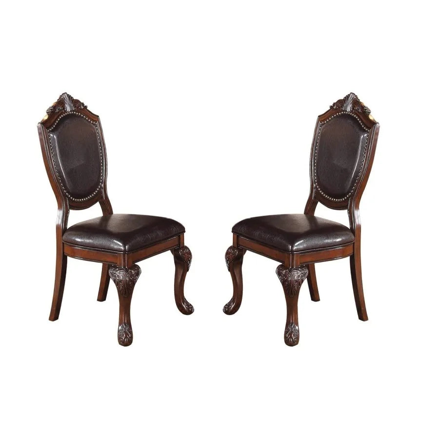 Five Piece Antique Dining Set With Round Table And Cushioned Chairs