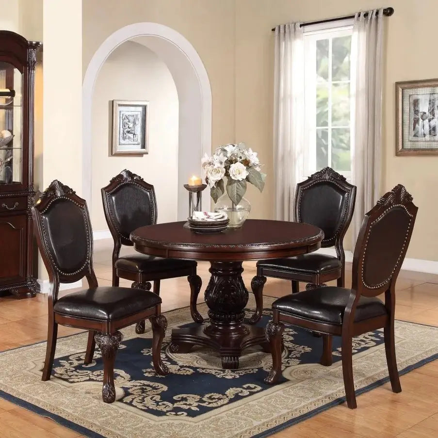Five Piece Antique Dining Set With Round Table And Cushioned Chairs