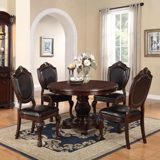Five Piece Antique Dining Set With Round Table And Cushioned Chairs