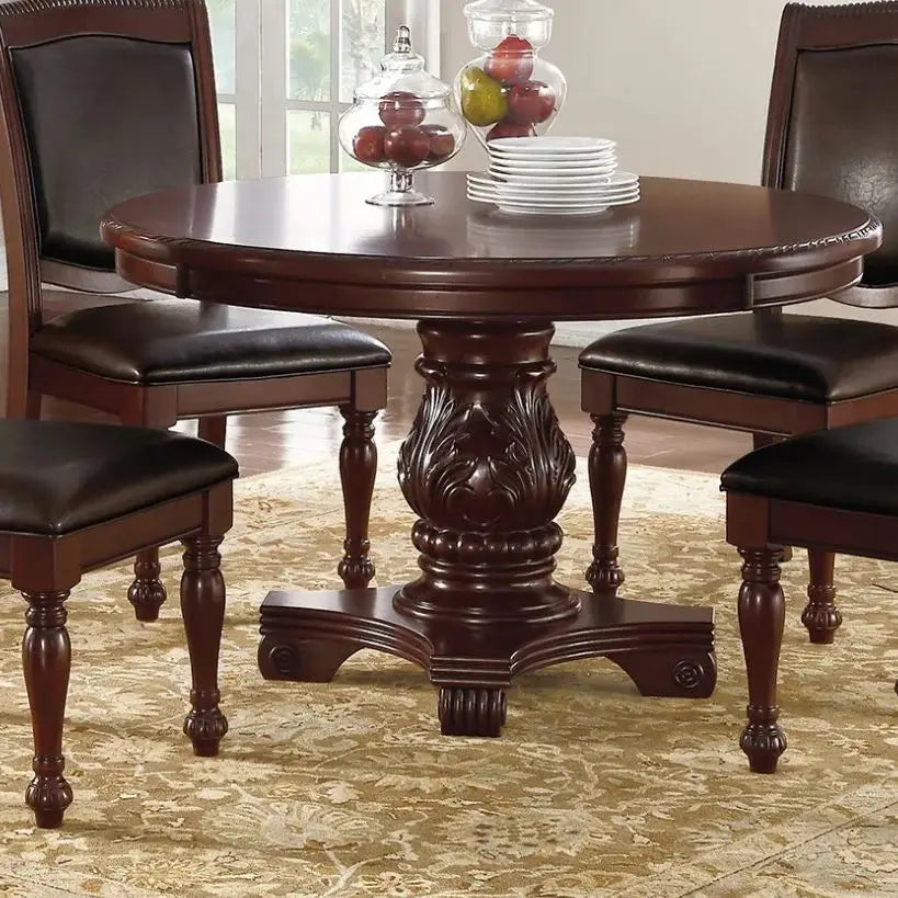 Five Piece Antique Dining Set With Round Table And Cushioned Chairs